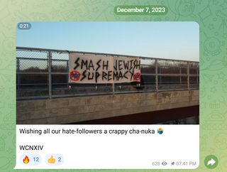 screenshot of banner over expressway reading smash jewish supremacy with crossed out stars of david

caption reads "wishing all our hate-followers a crappy cha-nuka"