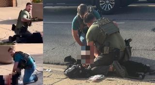two men in blue and green t shirts with police body armor